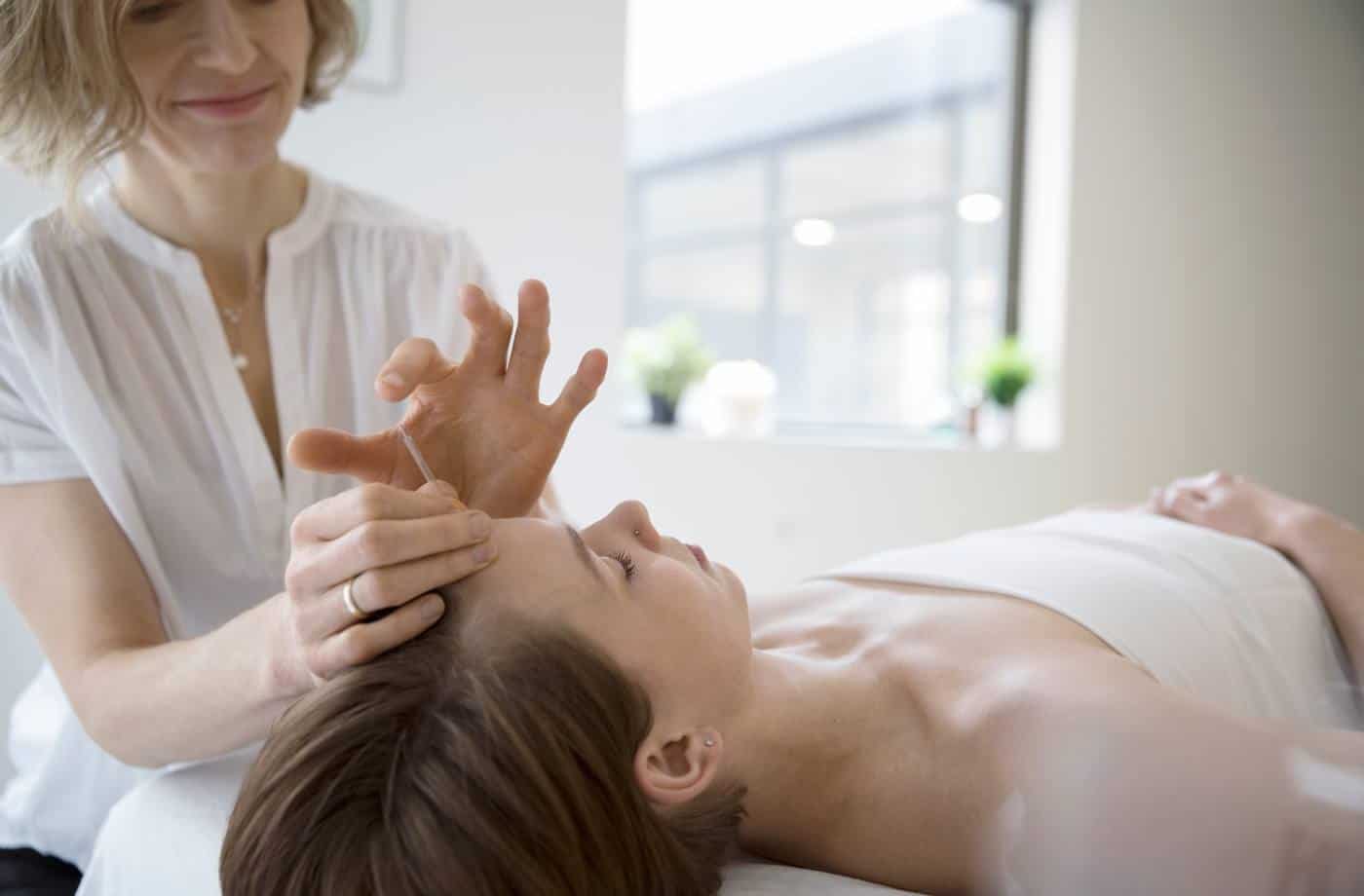 woman having acupuncture